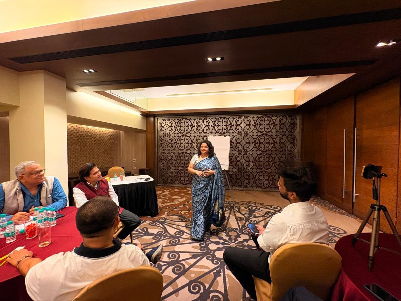 Shipra leading an intimate coaching session